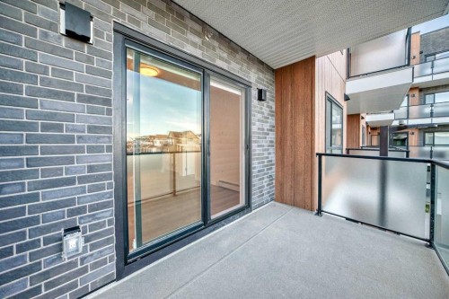 212-245 Edith Place Nw, Calgary, AB - Outdoor With Balcony With Exterior