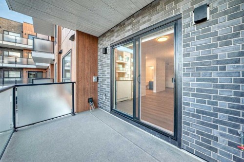 212-245 Edith Place Nw, Calgary, AB - Outdoor With Balcony With Exterior