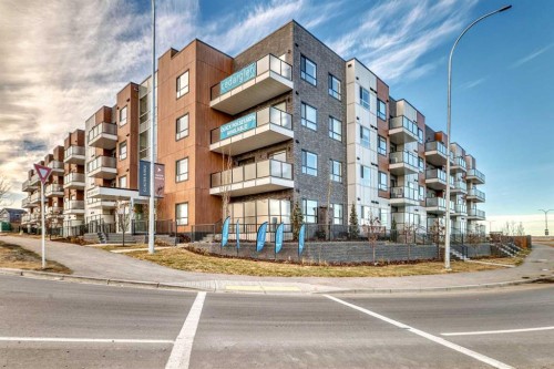 212-245 Edith Place Nw, Calgary, AB - Outdoor With Balcony With Facade