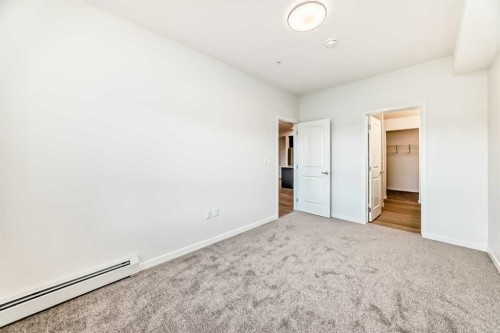 212-245 Edith Place Nw, Calgary, AB - Indoor Photo Showing Other Room