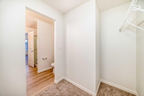 212-245 Edith Place Nw, Calgary, AB - Indoor Photo Showing Other Room