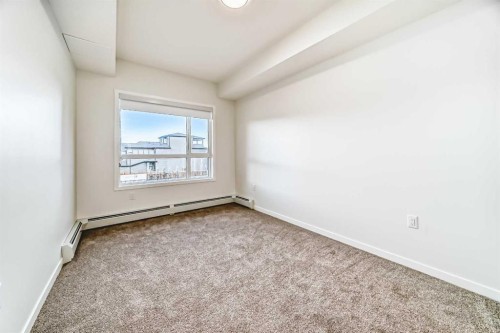 212-245 Edith Place Nw, Calgary, AB - Indoor Photo Showing Other Room