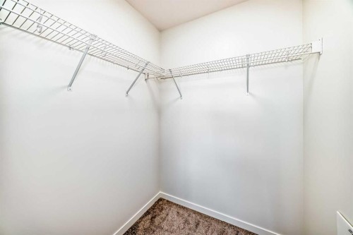 212-245 Edith Place Nw, Calgary, AB - Indoor With Storage