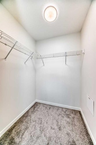 212-245 Edith Place Nw, Calgary, AB - Indoor With Storage
