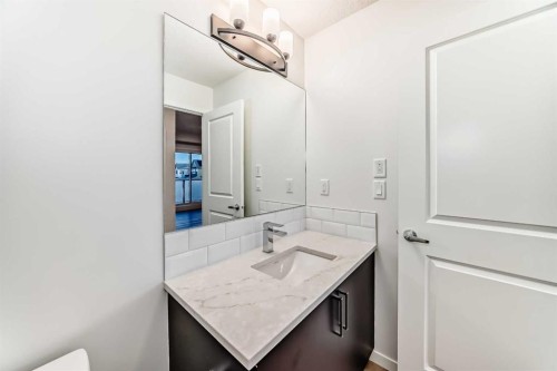 212-245 Edith Place Nw, Calgary, AB - Indoor Photo Showing Bathroom