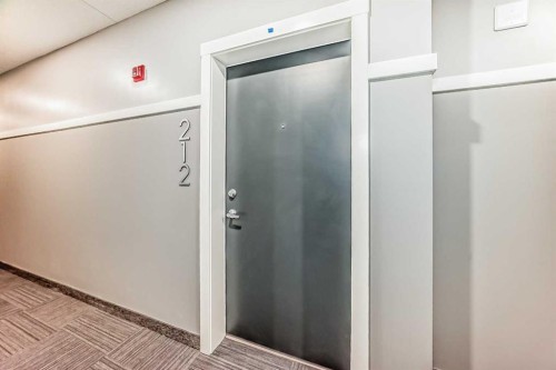 212-245 Edith Place Nw, Calgary, AB - Indoor Photo Showing Other Room