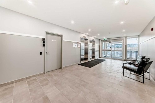 212-245 Edith Place Nw, Calgary, AB - Indoor Photo Showing Other Room