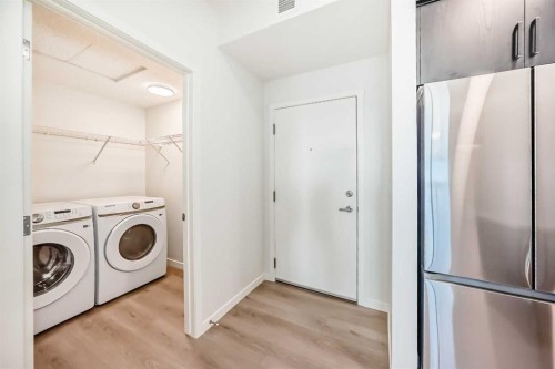212-245 Edith Place Nw, Calgary, AB - Indoor Photo Showing Laundry Room