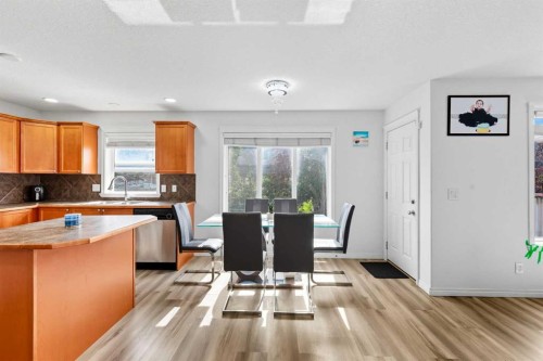 129 Luxstone Green Sw, Airdrie, AB - Indoor Photo Showing Kitchen With Double Sink