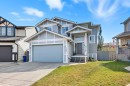 129 Luxstone Green Sw, Airdrie, AB  - Outdoor With Facade 