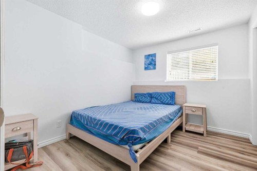129 Luxstone Green Sw, Airdrie, AB - Indoor Photo Showing Bedroom