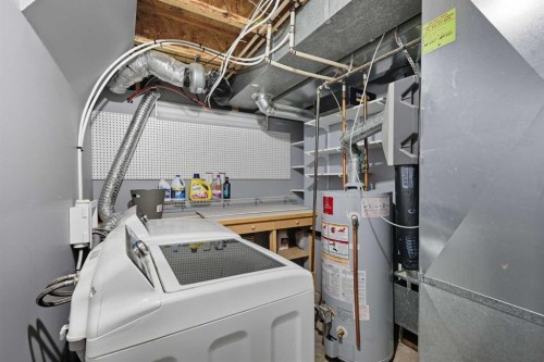 129 Luxstone Green Sw, Airdrie, AB - Indoor Photo Showing Laundry Room