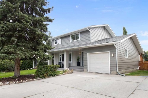 472 Cedarille Crescent Sw, Calgary, AB - Outdoor With Deck Patio Veranda With Facade