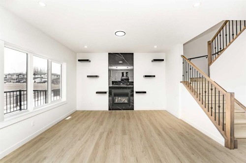 192 Lakewood Crescent, Strathmore, AB - Indoor With Fireplace