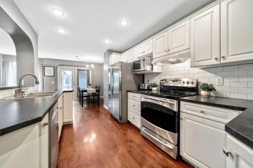 119 Bridlecreek Terrace, Calgary, AB - Indoor Photo Showing Kitchen With Stainless Steel Kitchen With Upgraded Kitchen