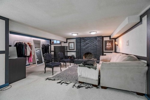 2427 Deer Side Drive, Calgary, AB - Indoor With Fireplace