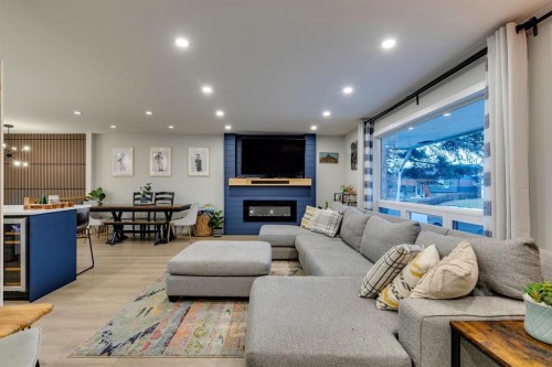 1324 Lake Sylvan Drive Se, Calgary, AB - Indoor Photo Showing Other Room With Fireplace