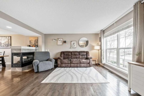354 Cranford Drive Se, Calgary, AB - Indoor Photo Showing Living Room