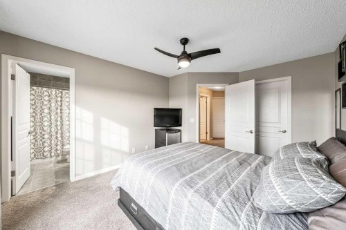 354 Cranford Drive Se, Calgary, AB - Indoor Photo Showing Bedroom