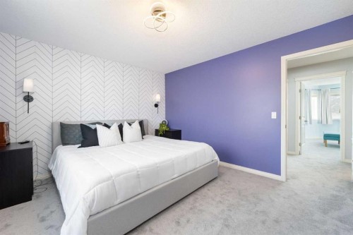 3-41 Hunters Gate, Okotoks, AB - Indoor Photo Showing Bedroom