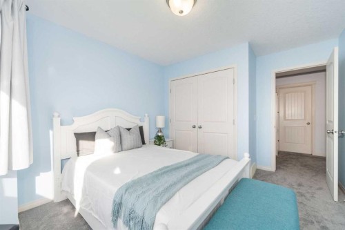 3-41 Hunters Gate, Okotoks, AB - Indoor Photo Showing Bedroom