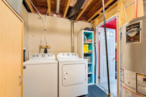 3-41 Hunters Gate, Okotoks, AB - Indoor Photo Showing Laundry Room