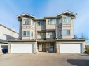 3-41 Hunters Gate, Okotoks, AB  - Outdoor With Facade 
