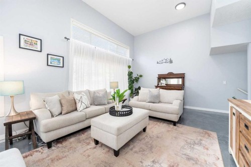 3-41 Hunters Gate, Okotoks, AB - Indoor Photo Showing Living Room