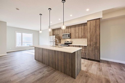 444 Shawnee Square Sw, Calgary, AB - Indoor Photo Showing Kitchen With Upgraded Kitchen