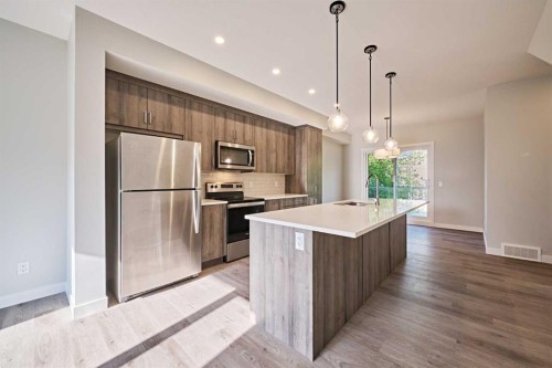 444 Shawnee Square Sw, Calgary, AB - Indoor Photo Showing Kitchen With Stainless Steel Kitchen With Upgraded Kitchen