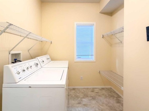 21 Panamount Hill Nw, Calgary, AB - Indoor Photo Showing Laundry Room