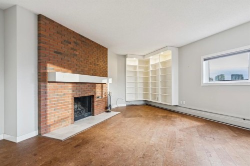 2D-215 2 Street Ne, Calgary, AB - Indoor With Fireplace