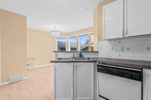265 Fresno Place Ne, Calgary, AB - Indoor Photo Showing Kitchen With Double Sink