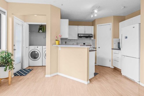 265 Fresno Place Ne, Calgary, AB - Indoor Photo Showing Laundry Room