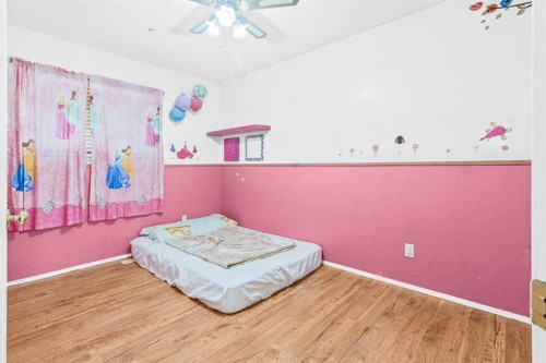 265 Fresno Place Ne, Calgary, AB - Indoor Photo Showing Bedroom