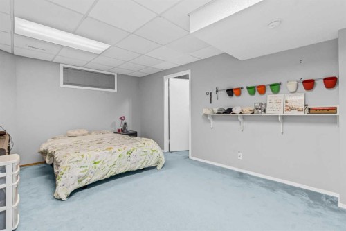 265 Fresno Place Ne, Calgary, AB - Indoor Photo Showing Bedroom