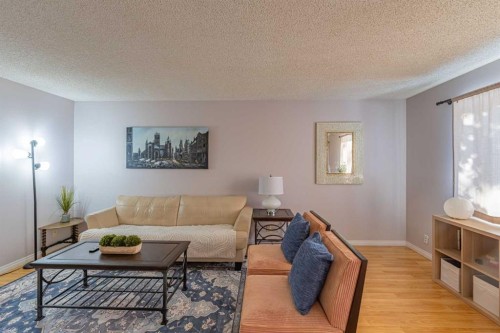 130 27 Avenue Nw, Calgary, AB - Indoor Photo Showing Living Room