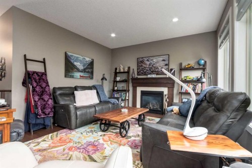 125 Walden Rise Se, Calgary, AB - Indoor Photo Showing Living Room With Fireplace