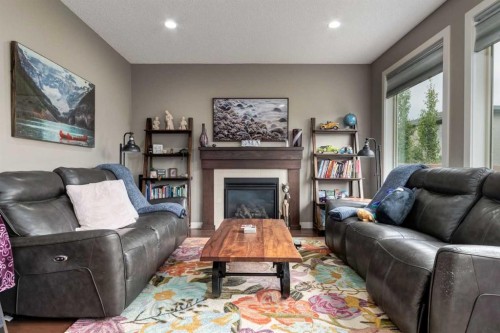 125 Walden Rise Se, Calgary, AB - Indoor Photo Showing Living Room With Fireplace
