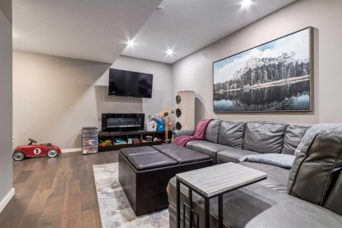 125 Walden Rise Se, Calgary, AB - Indoor Photo Showing Other Room With Fireplace