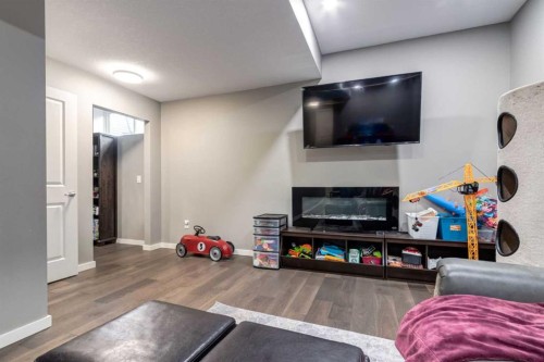 125 Walden Rise Se, Calgary, AB - Indoor With Fireplace