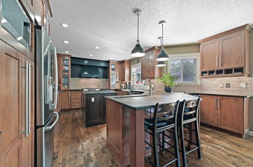 41 Strathridge Crescent Sw, Calgary, AB - Indoor Photo Showing Kitchen With Stainless Steel Kitchen With Upgraded Kitchen