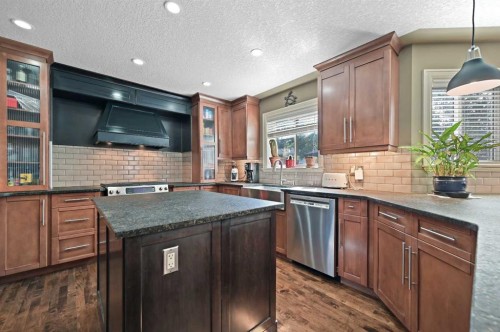 41 Strathridge Crescent Sw, Calgary, AB - Indoor Photo Showing Kitchen With Upgraded Kitchen