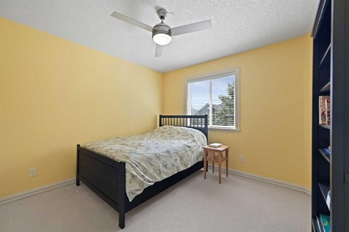 41 Strathridge Crescent Sw, Calgary, AB - Indoor Photo Showing Bedroom