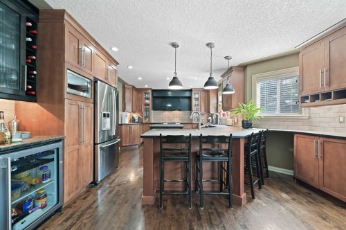 41 Strathridge Crescent Sw, Calgary, AB - Indoor Photo Showing Kitchen With Upgraded Kitchen