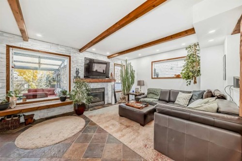 99 Covewood Park Ne, Calgary, AB - Indoor Photo Showing Living Room With Fireplace