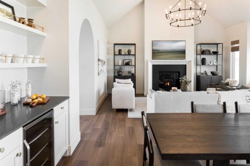 138 Legacy Forest Heights Se, Calgary, AB - Indoor Photo Showing Dining Room With Fireplace