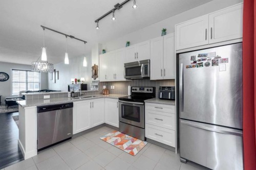 408 Nolanfield Villas Nw, Calgary, AB - Indoor Photo Showing Kitchen With Upgraded Kitchen