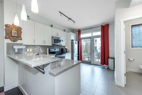 408 Nolanfield Villas Nw, Calgary, AB - Indoor Photo Showing Kitchen With Upgraded Kitchen