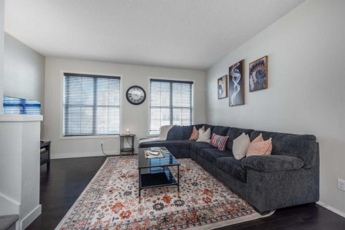 408 Nolanfield Villas Nw, Calgary, AB - Indoor Photo Showing Living Room